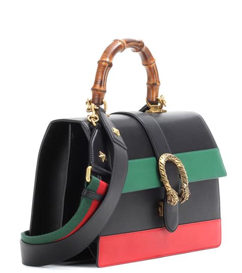 black gucci backpack with red and green stripe|Gucci black small backpack.